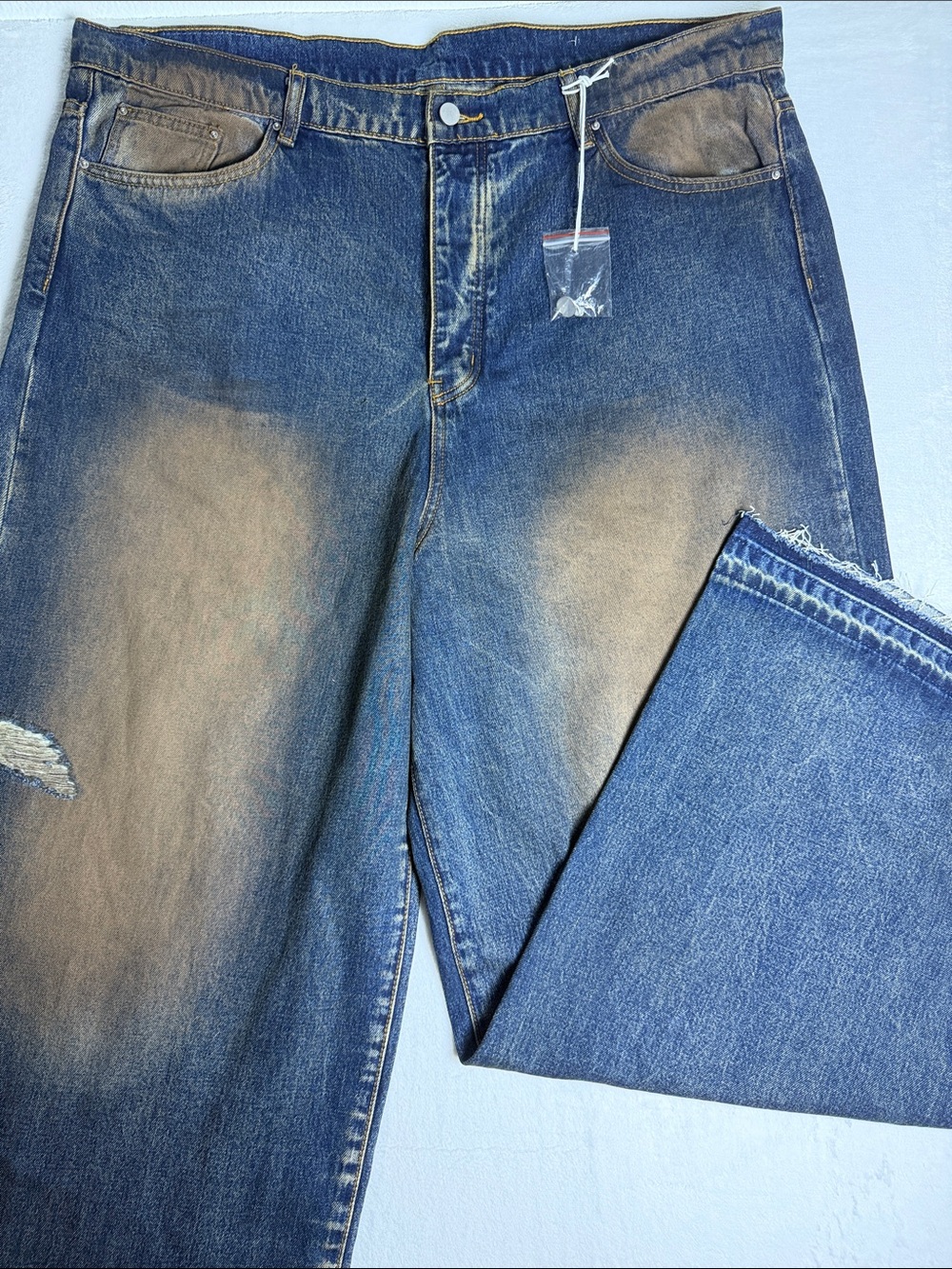 MNML Men's Blue Relaxed Jeans with Brown Fade Accents